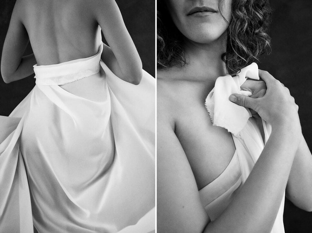 Boudoir photography of an anonymous woman with brown, curly hair wrapped in a white sheet in studio in Cape Town, South Africa
