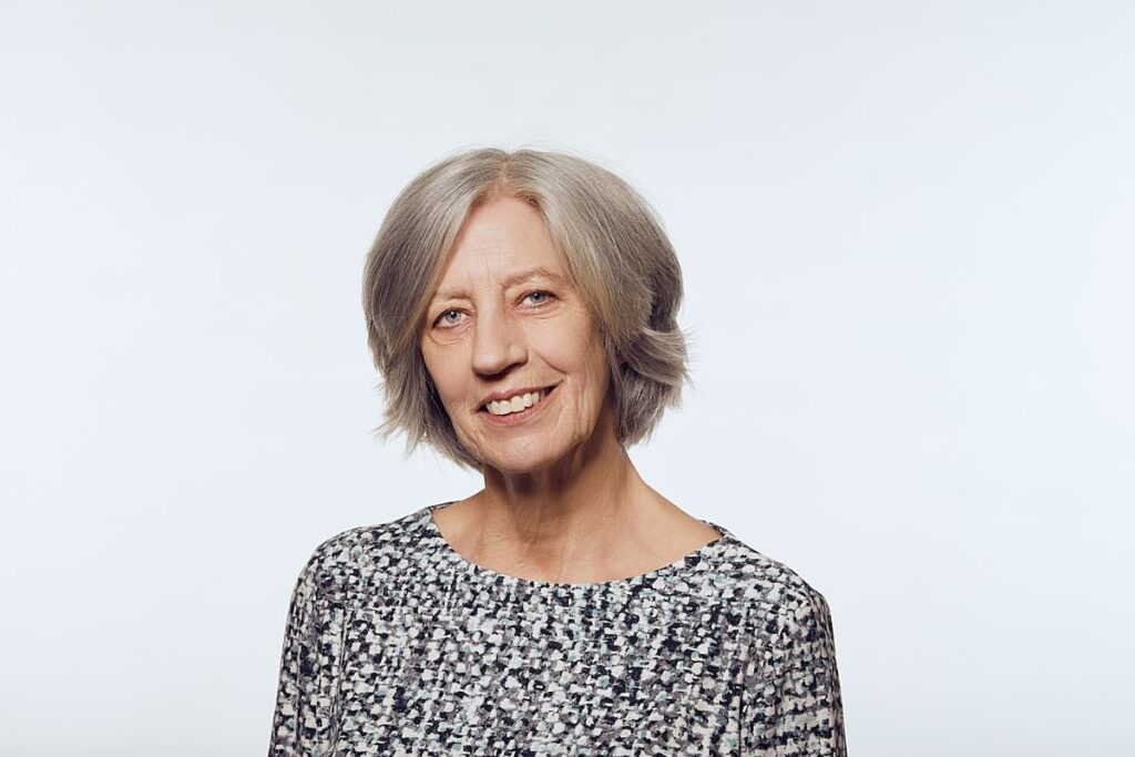 Personal branding photography of a woman in her 60's with grey hair in studio in Cape Town, South Africa