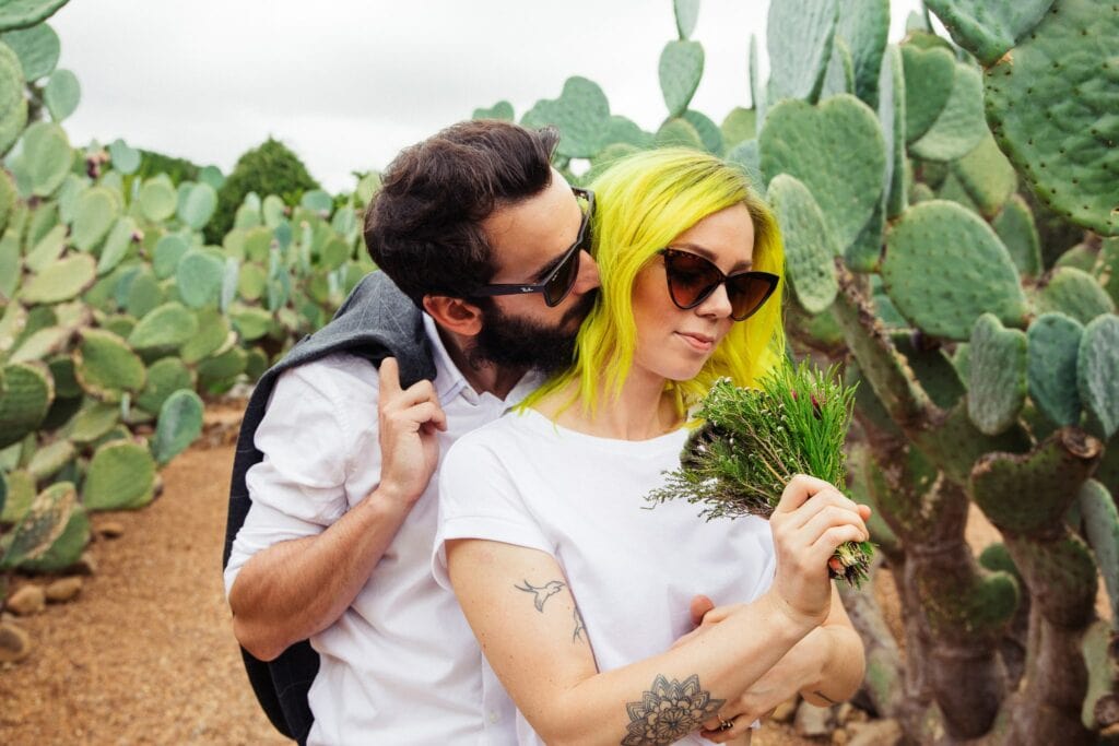 Elopement photography of a rock n roll, quirky bride and groom in a garden of cacti in Cape Town, South Africa