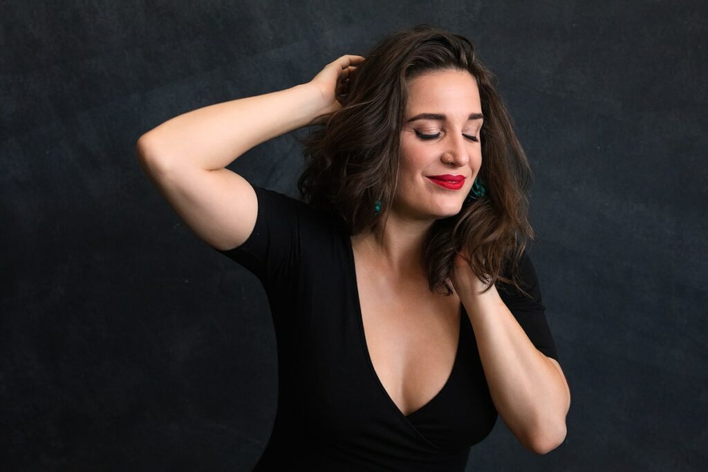 Boudoir and sensual portrait photography of an woman with mid length brown hair and red lipstick in studio in Cape Town, South Africa